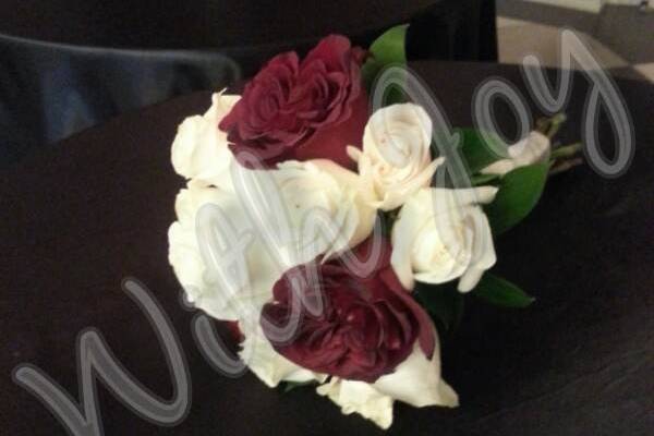 Black baccara and ivory roses