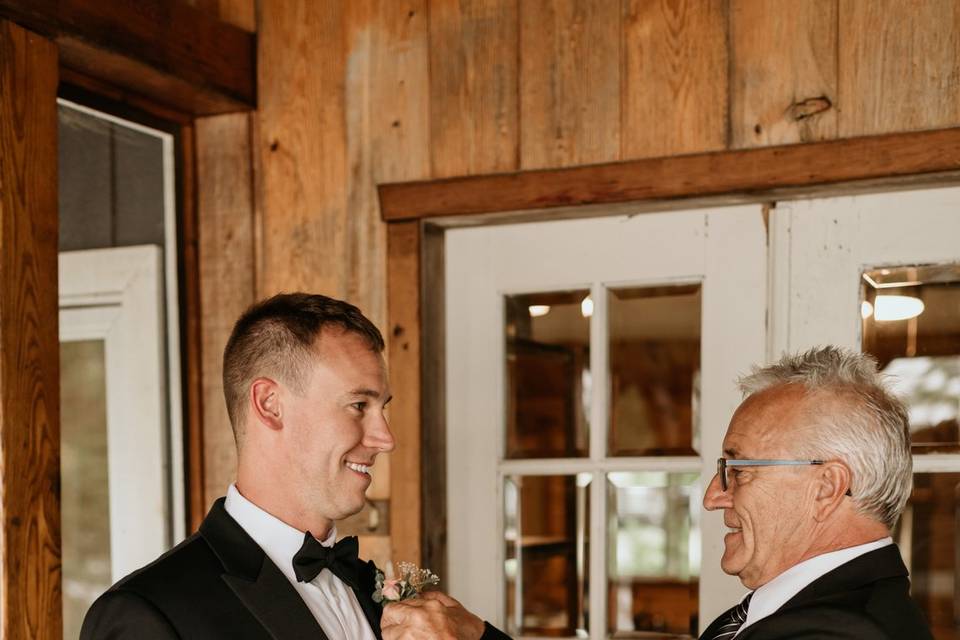 Groom and father getting ready