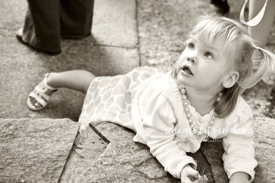 Young Girls Lies on Ground