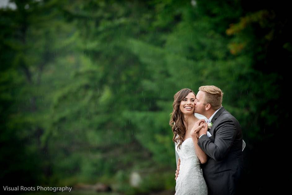 Bride and groom embrace