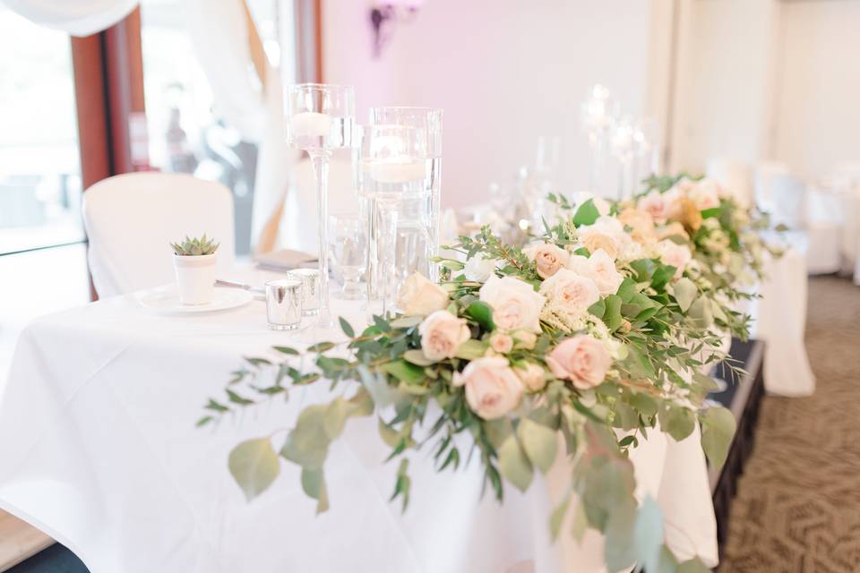 Lush floral runner head table