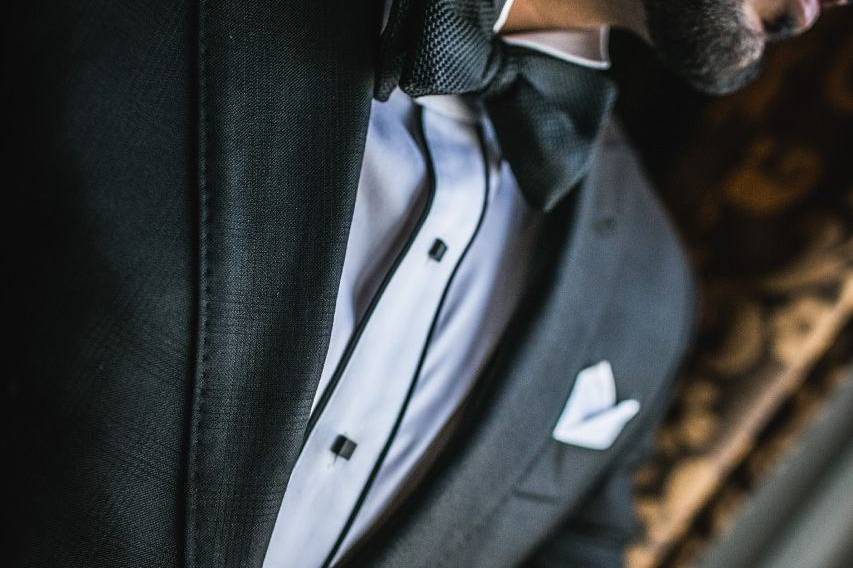 Suit with bow tie