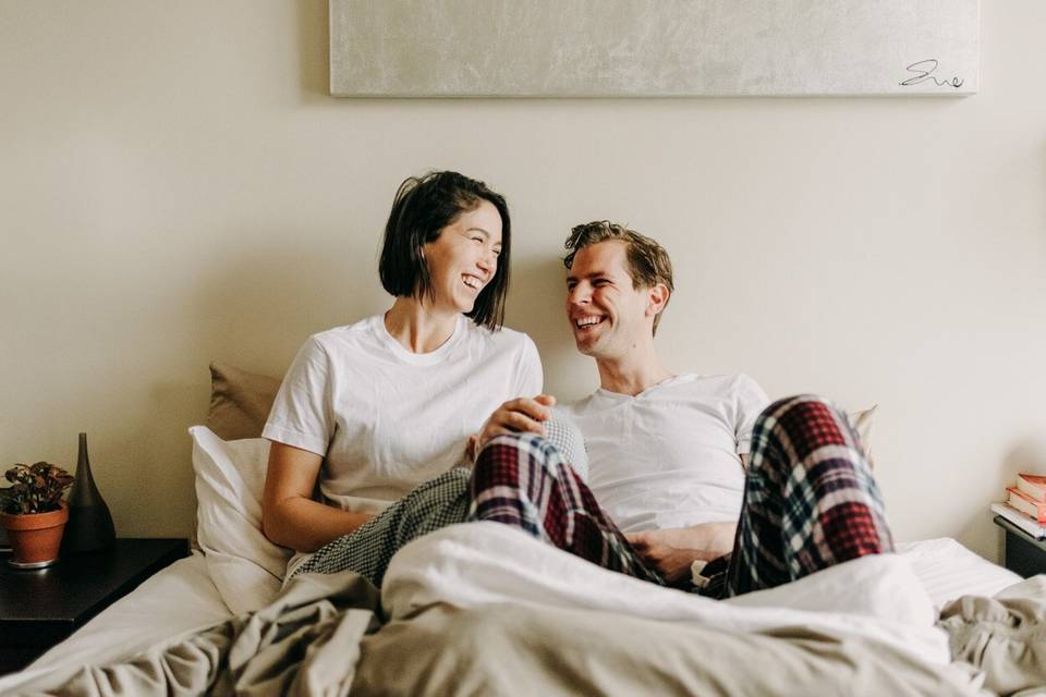 Laughing in bed