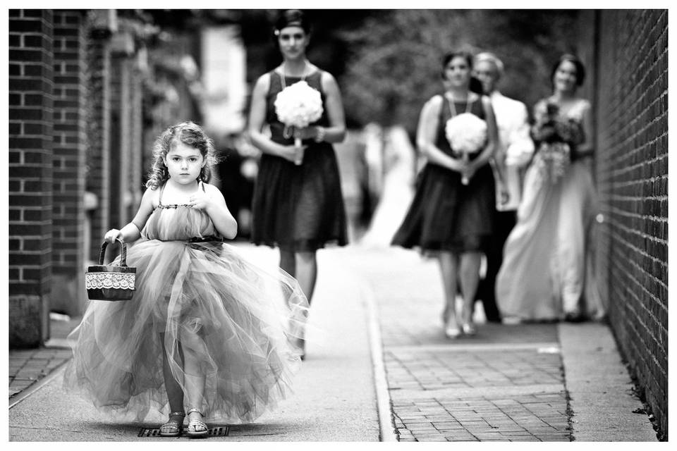 Flower girl leads