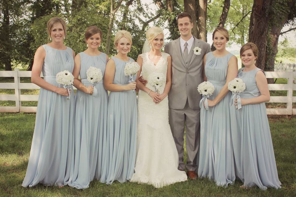 Bridesmaids and newlyweds