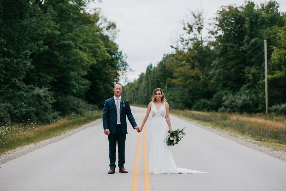 Couple posing in an empty street