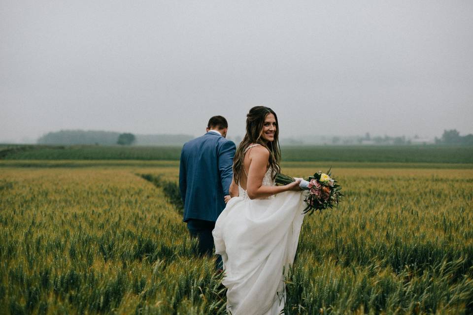 Newlyweds in a field