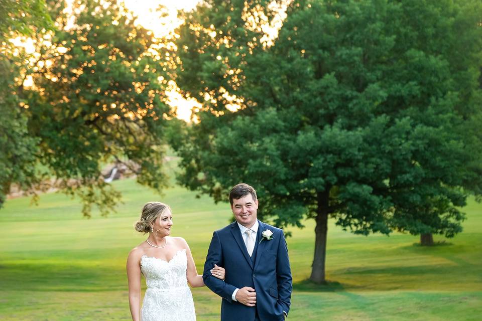 Couple walks arm in arm