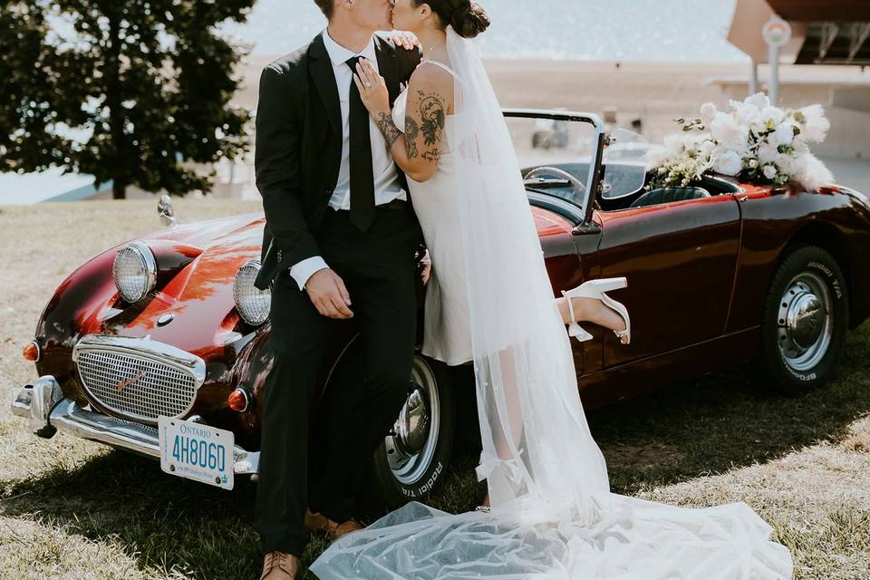 Kissing in front of the car