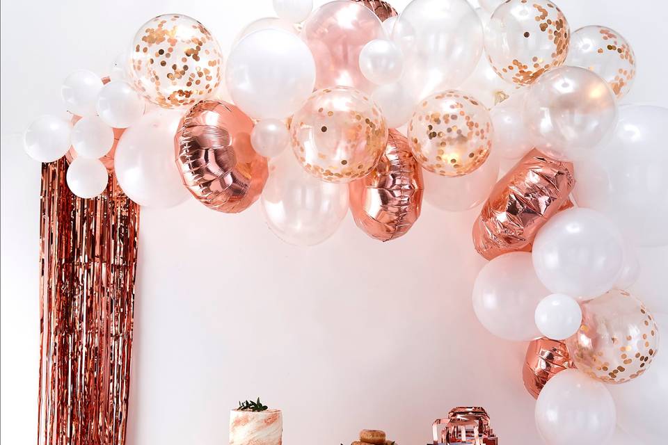 Rose gold balloon arch