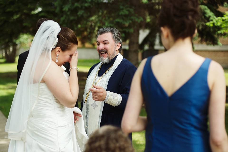 Groom watching his bride