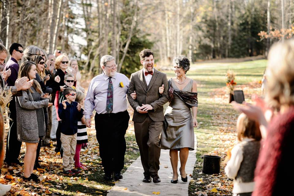 Parents walking groom