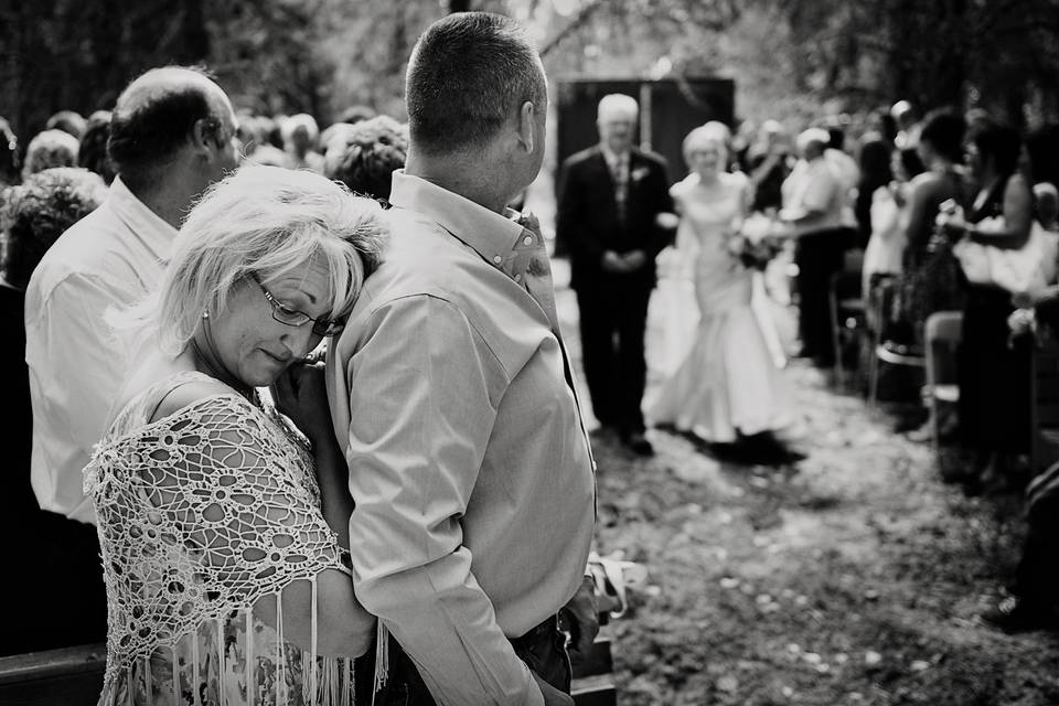 Parents walking groom