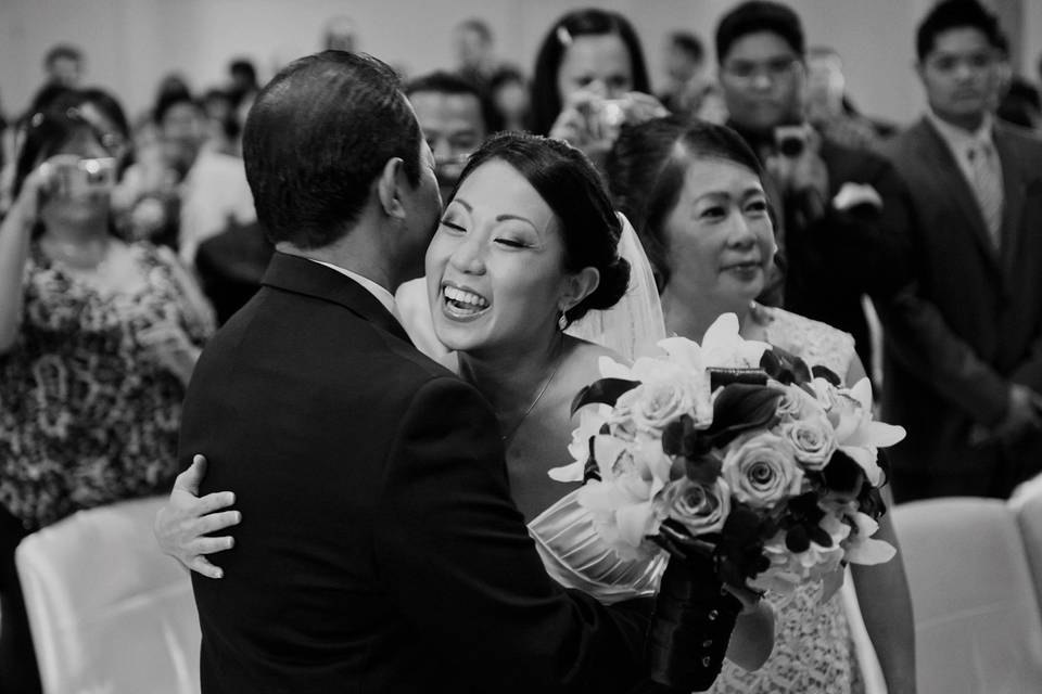 Father bride hug