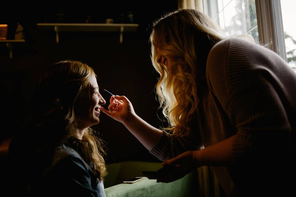 Bride getting make up