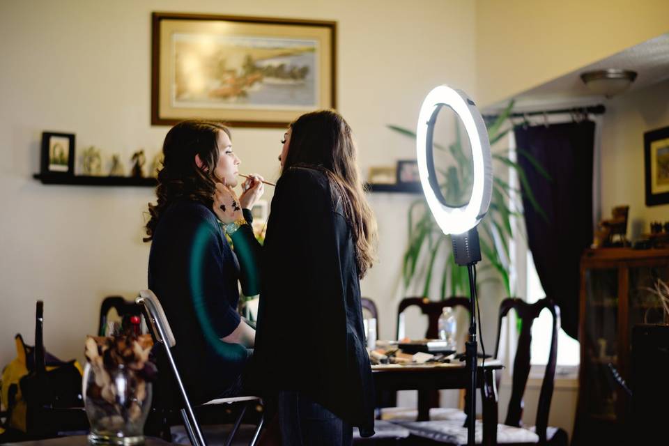 Bride getting make up