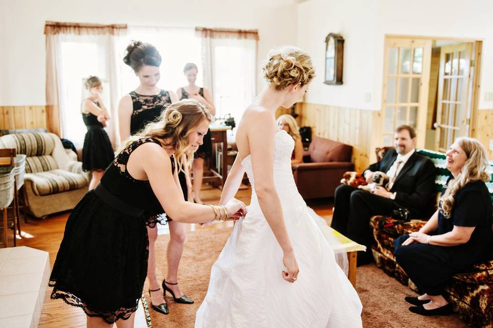 Mother doing brides dress up