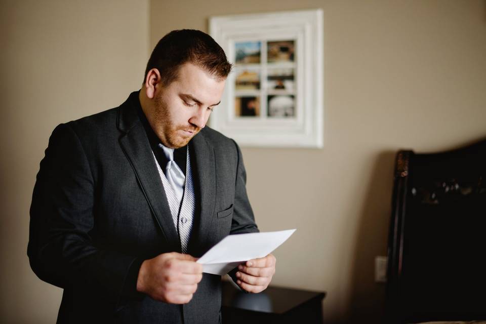 Reading letter from his bride