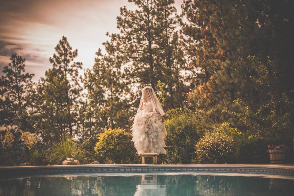 Bride by pool