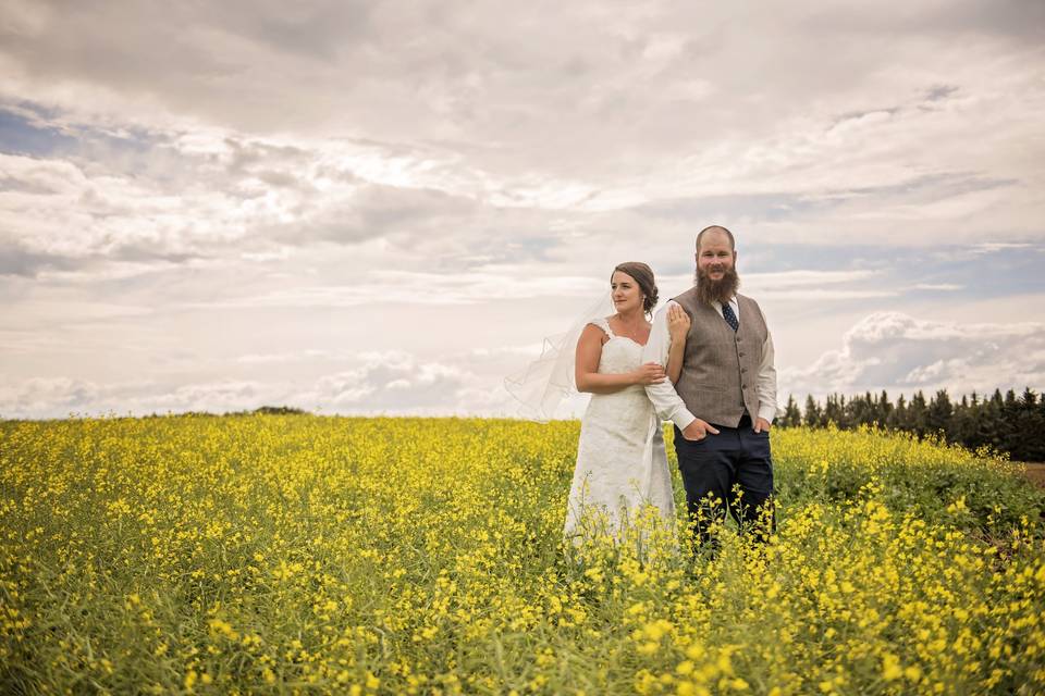 Canola field couple