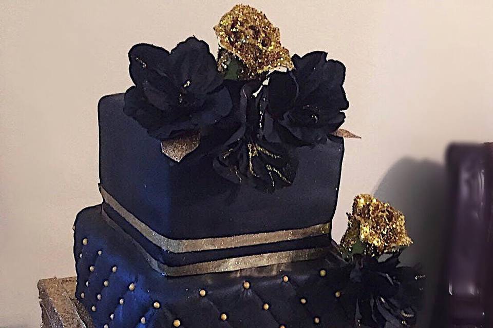 4 Tier Black and Gold Cake
