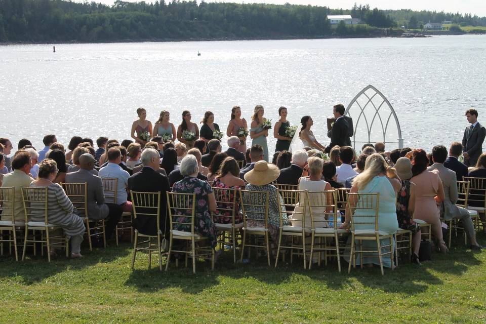 Ceremony by the water.