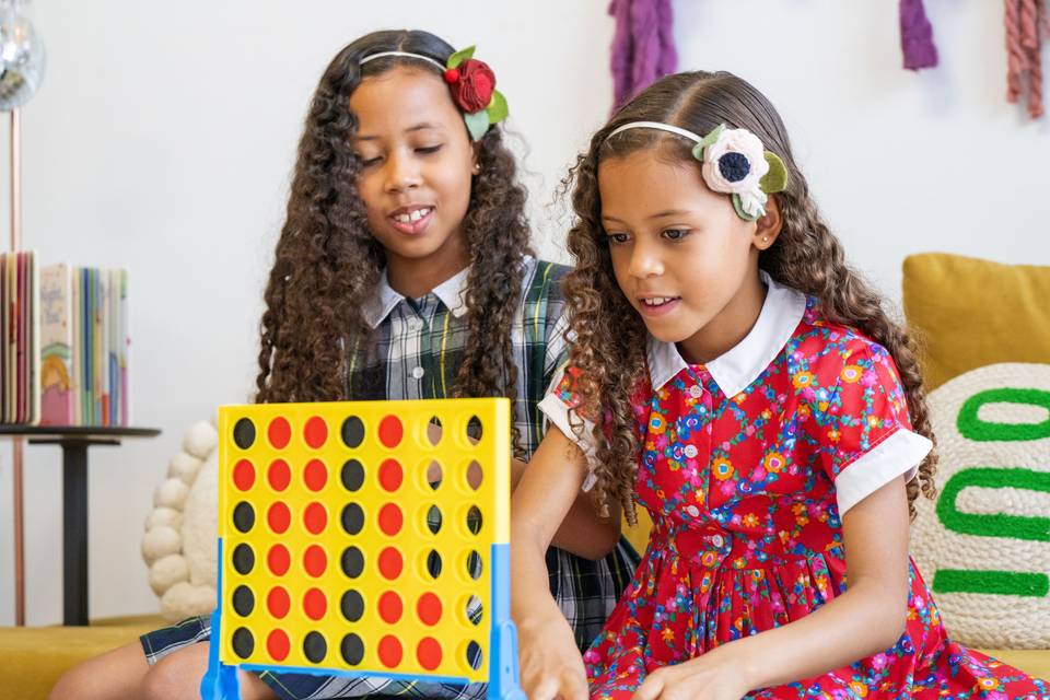 Girls playing connect four