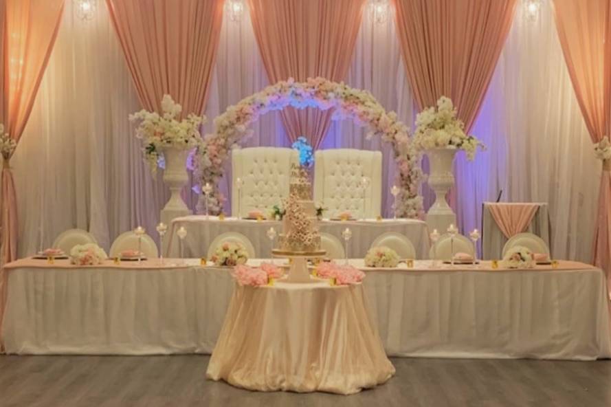 Blush and white wedding arch