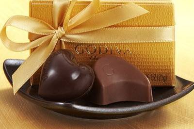 Gold favor with gold ribbon