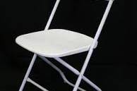 White folding chairs