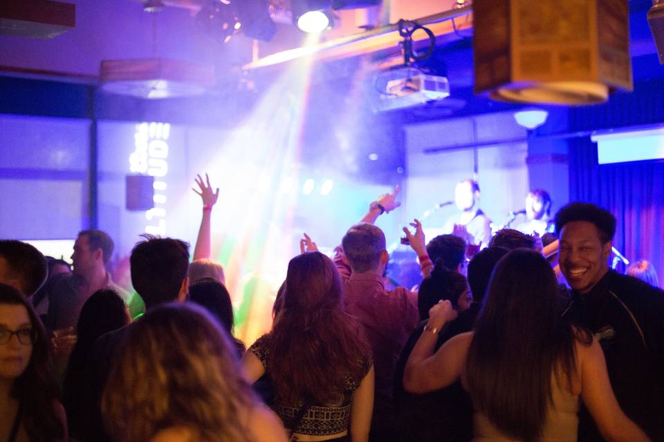 Guitar and crowd in university