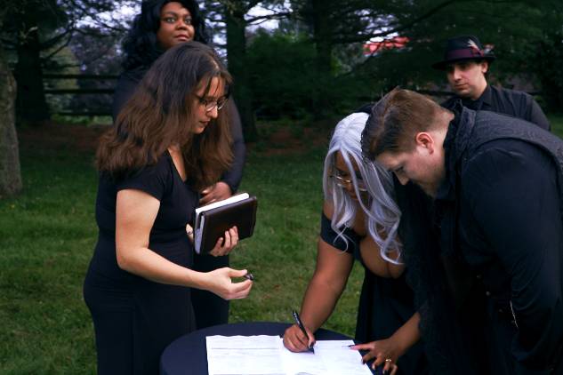 Signing wedding certificate - Jonmakesmedia