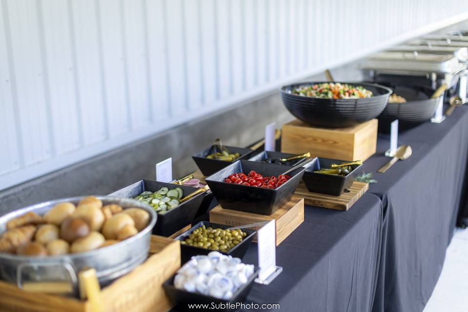 Buffet with pickles and olives