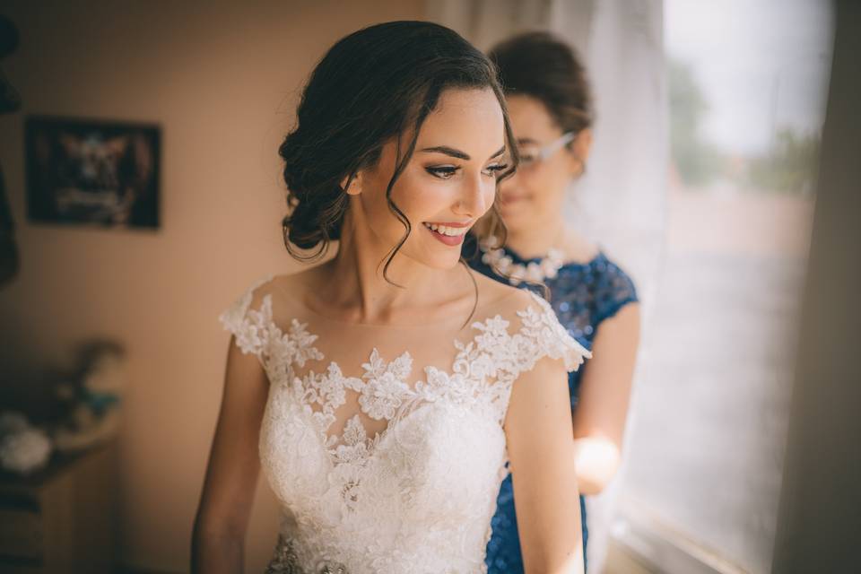 Mom helping with the dress