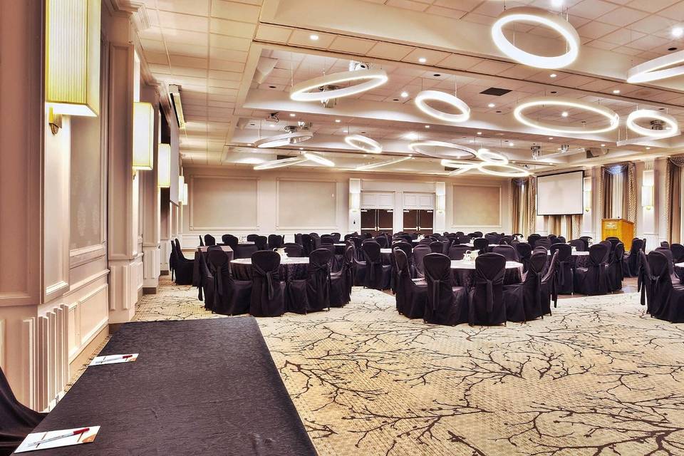 Crowne Plaza Ballroom with black tables and chairs