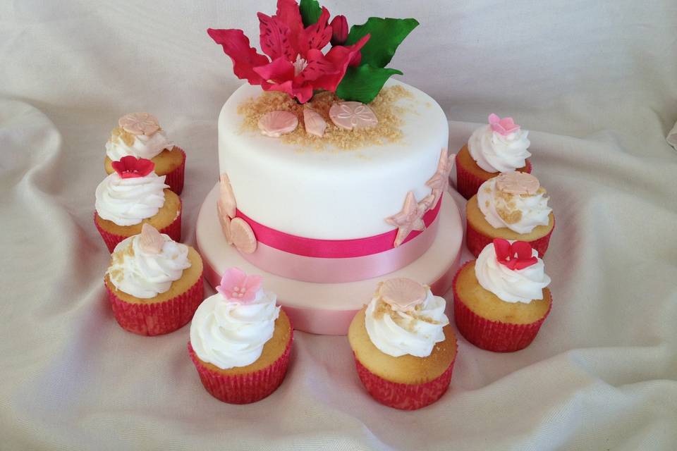 Pink beach cake and cupcakes