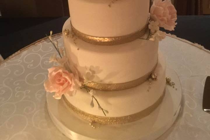 Gold ribbons and pink roses