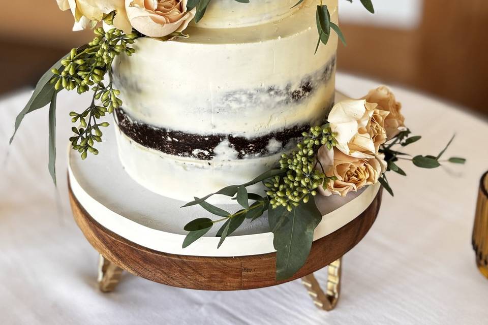 Naked cake with fresh flowers