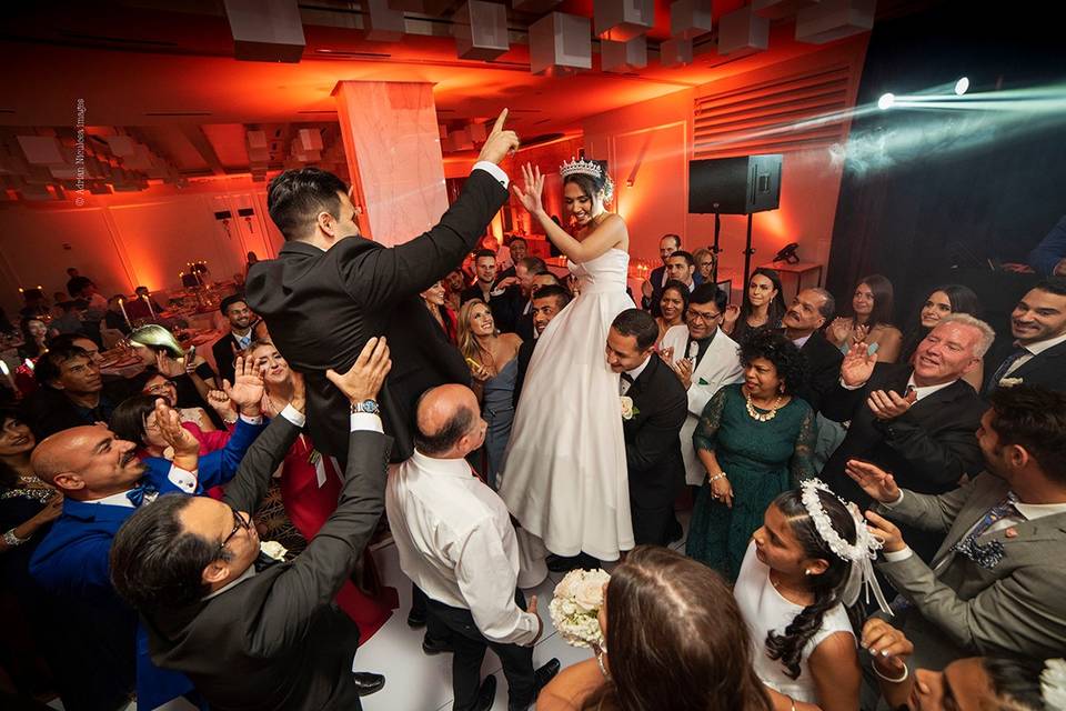 Holding the floral bouquets