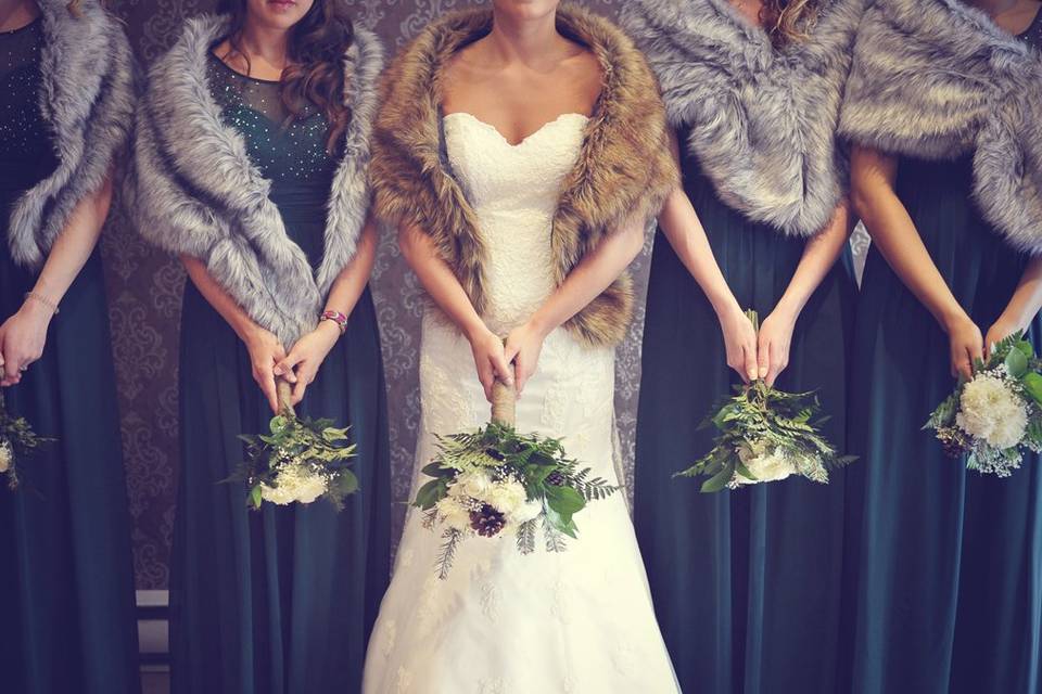 Holding the floral bouquets