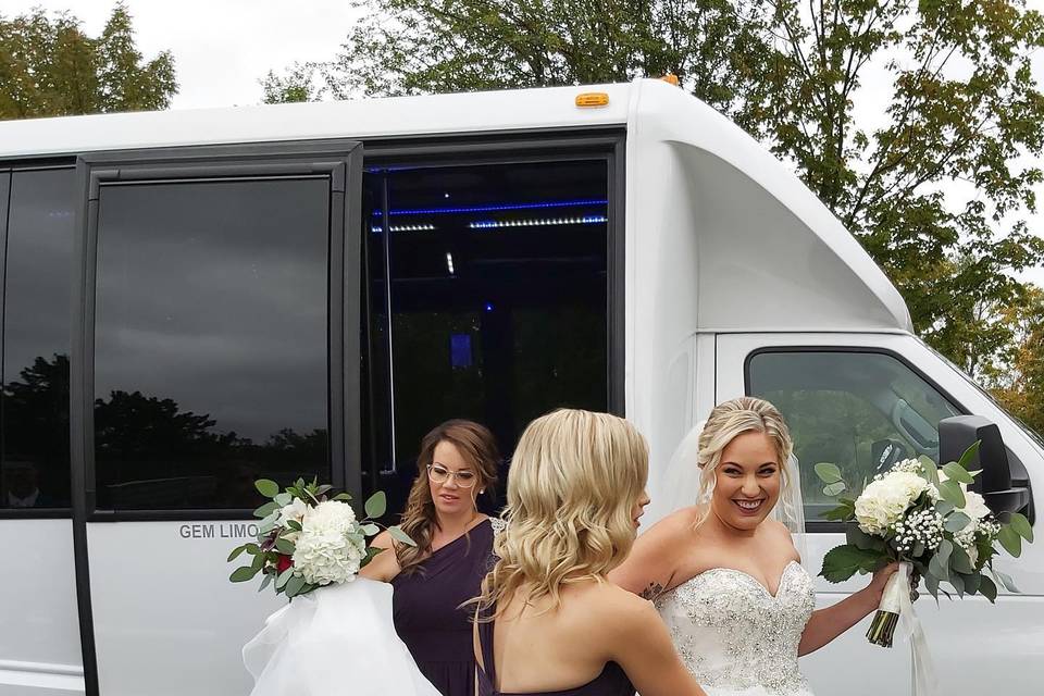 Bride exiting the bus