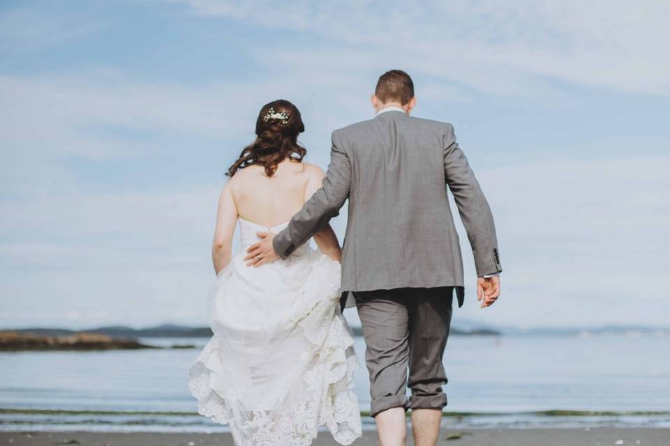 Bride and groom on beach