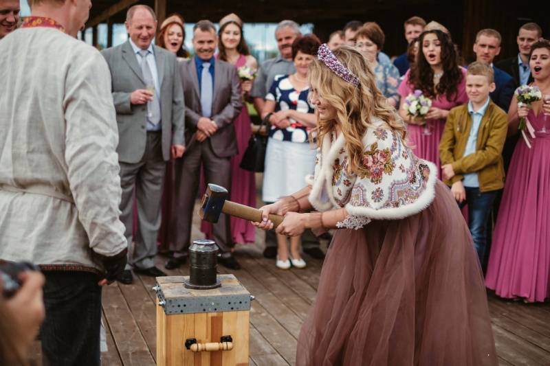 Bride striking a wedding coin