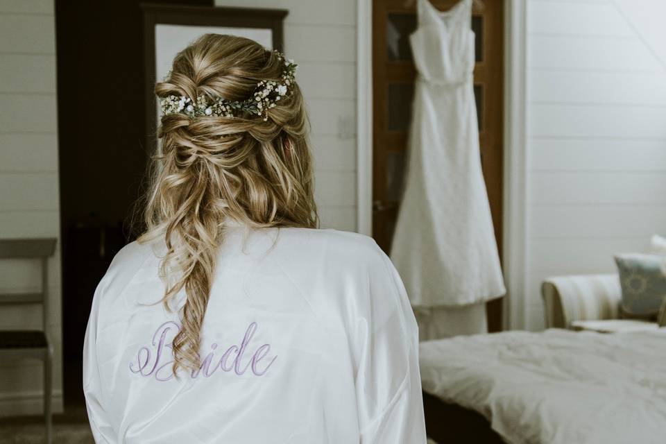 Bride admiring her gown