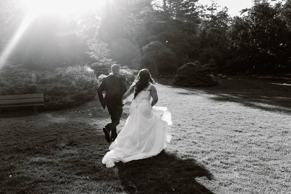 Bride and Groom Running Togeth