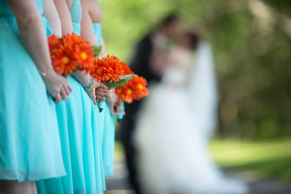 Bridesmaids with newlyweds