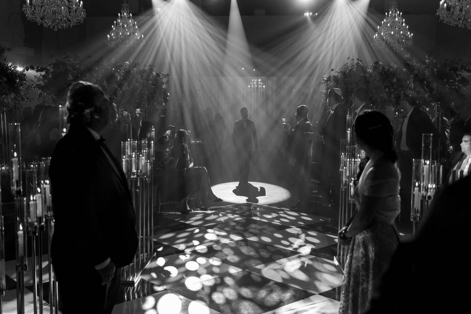 Groom walking down the aisle