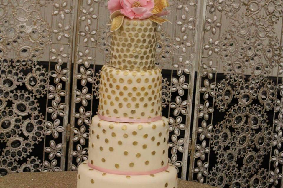 Four tier cake with edible flo