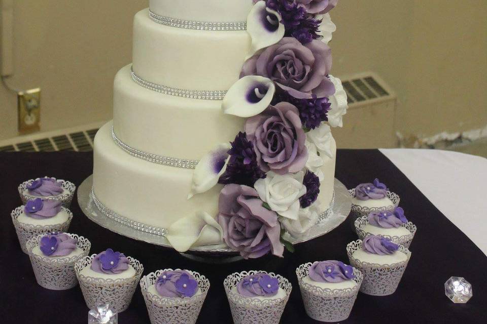 Wedding cake and cupcakes