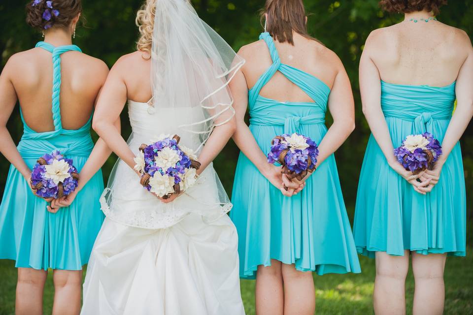 Bridal party holding flowers